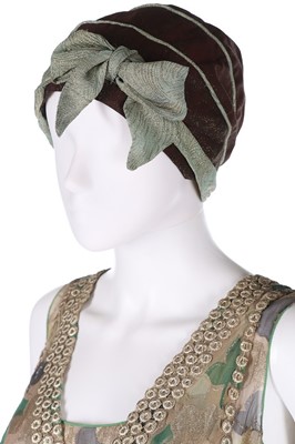 Lot 3 - A printed lamé cocktail dress, the fabric...