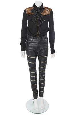Lot 5 - A pair of Saint Laurent by Hedi Slimane men's black and gold leather trousers, Autumn-Winter 2015-16