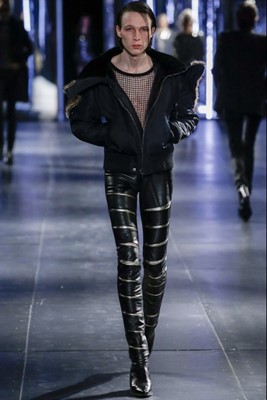 Lot 5 - A pair of Saint Laurent by Hedi Slimane men's black and gold leather trousers, Autumn-Winter 2015-16