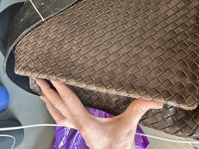 Lot 23 - A Bottega Veneta brown intrecciato leather messenger bag, 2007