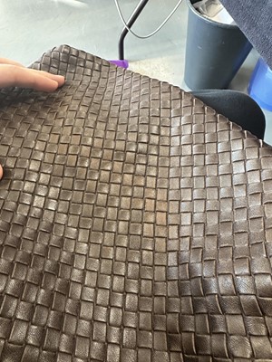 Lot 23 - A Bottega Veneta brown intrecciato leather messenger bag, 2007