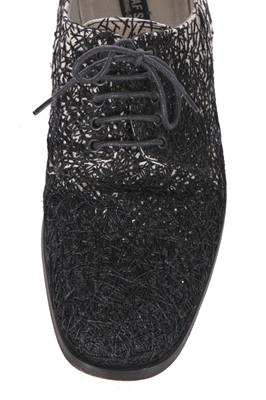 Lot 66 - Four pairs of designer boots and shoes, 2000s-2010s