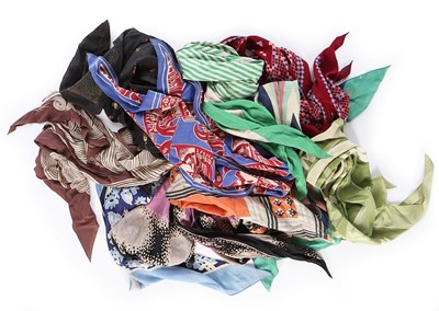 Lot 8 - A large group of colourful blouses and...