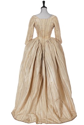Lot 678 - A brocaded ivory silk robe a l'Anglaise, 1780s