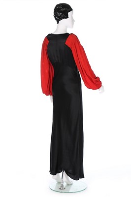 Lot 9 - Ten black and red evening/afternoon dresses,...