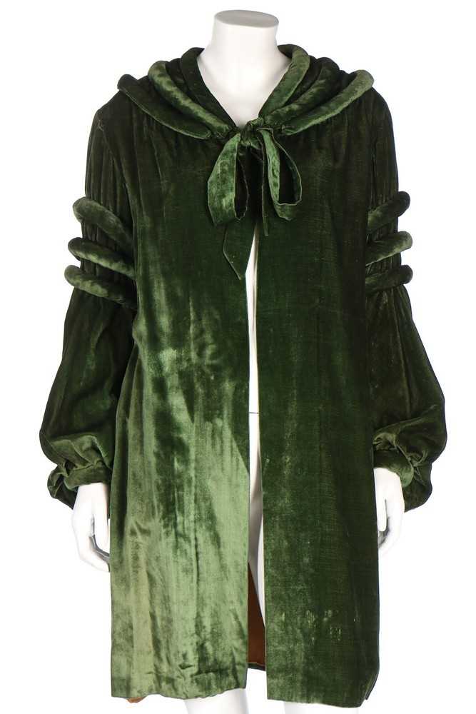 Lot 30 - A green velvet evening coat, early 1930s, with...