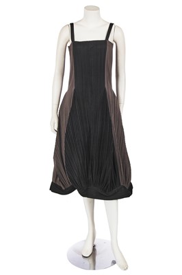 Lot 290 - An Issey Miyake grey and black pleated polyester dress, Autumn-Winter 1990-91
