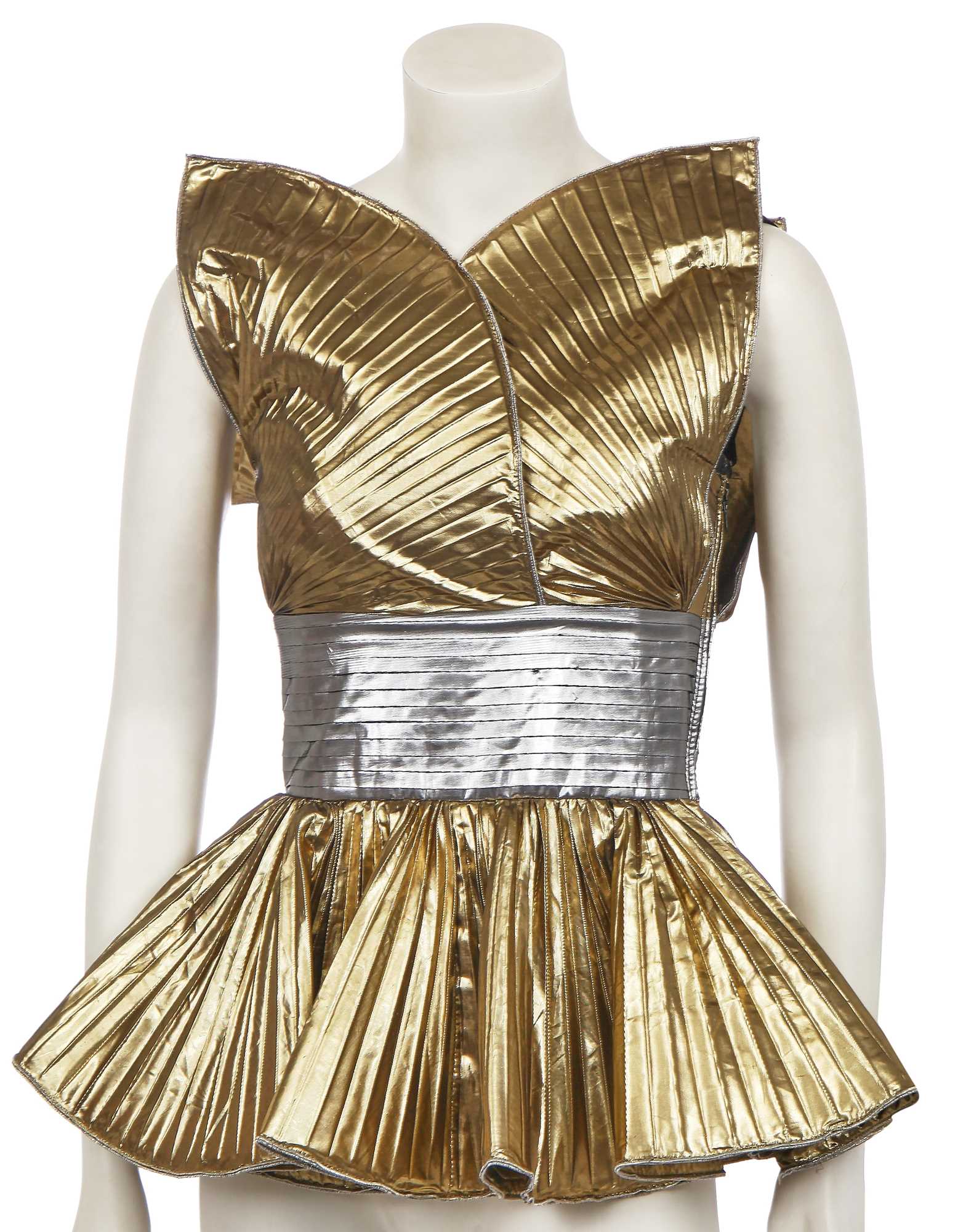 Lot 231 - Shingai of 'The Noisettes' stage-worn Dolce and Gabbana gold and silver lamé top, circa 2009