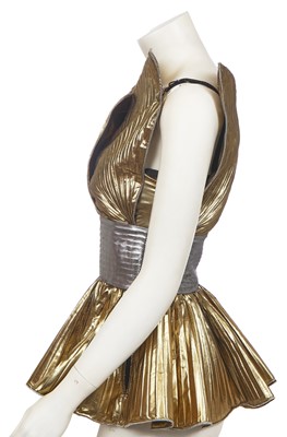 Lot 231 - Shingai of 'The Noisettes' stage-worn Dolce and Gabbana gold and silver lamé top, circa 2009