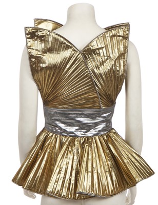 Lot 231 - Shingai of 'The Noisettes' stage-worn Dolce and Gabbana gold and silver lamé top, circa 2009