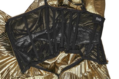 Lot 231 - Shingai of 'The Noisettes' stage-worn Dolce and Gabbana gold and silver lamé top, circa 2009