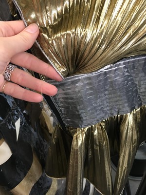 Lot 231 - Shingai of 'The Noisettes' stage-worn Dolce and Gabbana gold and silver lamé top, circa 2009
