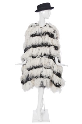 Lot 17 - A Chanel by Karl Lagerfeld black and white fantasy tweed and ostrich feather cloak, 'Paris-Dallas' collection, Métiers d'Art, Pre-Fall 2014
