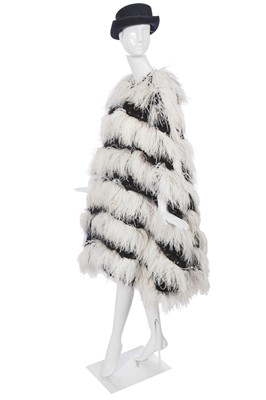 Lot 17 - A Chanel by Karl Lagerfeld black and white fantasy tweed and ostrich feather cloak, 'Paris-Dallas' collection, Métiers d'Art, Pre-Fall 2014