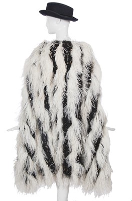 Lot 17 - A Chanel by Karl Lagerfeld black and white fantasy tweed and ostrich feather cloak, 'Paris-Dallas' collection, Métiers d'Art, Pre-Fall 2014