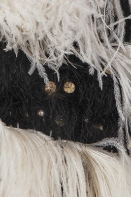 Lot 17 - A Chanel by Karl Lagerfeld black and white fantasy tweed and ostrich feather cloak, 'Paris-Dallas' collection, Métiers d'Art, Pre-Fall 2014