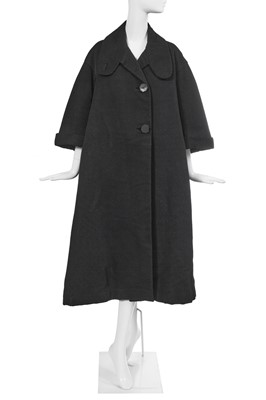Lot 432 - A Christian Dior haute couture black silk swagger coat, Autumn-Winter 1952-53
