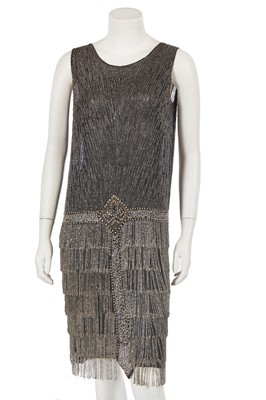 Lot 623 - A beaded and fringed black beaded muslin flapper dress, circa 1928