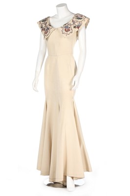 Lot 153 - An ivory silk-pique silk evening gown with...