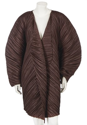 Lot 288 - An Issey Miyake brown pleated polyester coat, Spring-Summer 1995