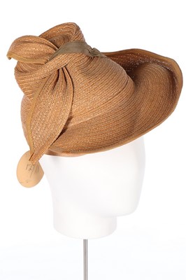 Lot 11 - A group of felt and straw hats, 1920s-40s,...