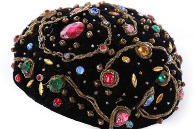 Lot 98 - A Balenciaga 'jewel' encrusted velvet toque,...