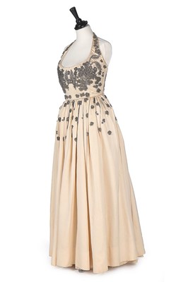 Lot 74 - A Molyneux couture ivory silk grosgrain...