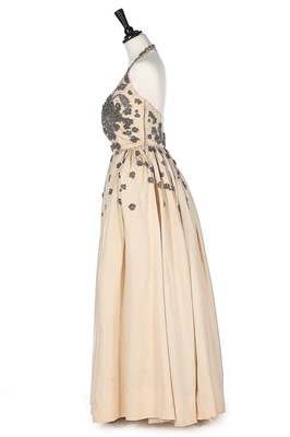 Lot 74 - A Molyneux couture ivory silk grosgrain...