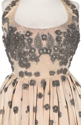 Lot 74 - A Molyneux couture ivory silk grosgrain...