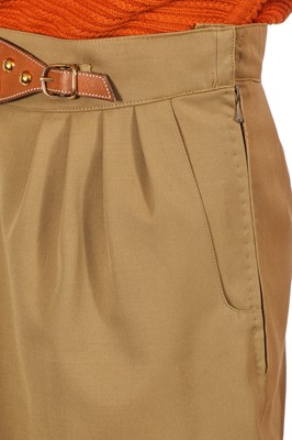Lot 179 - An Hermès green-beige wool skirt, late 1980s-90s
