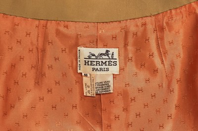 Lot 179 - An Hermès green-beige wool skirt, late 1980s-90s