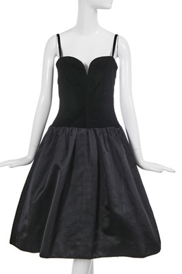 Lot 387 - An Yves Saint Laurent haute couture black satin and velvet dress, Autumn-Winter 1979-80