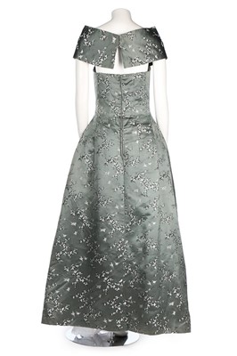 Lot 24 - A Jean Patou chinoiserie brocaded satin gown,...