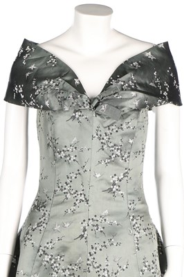 Lot 24 - A Jean Patou chinoiserie brocaded satin gown,...