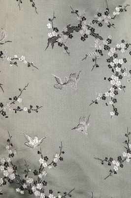 Lot 24 - A Jean Patou chinoiserie brocaded satin gown,...