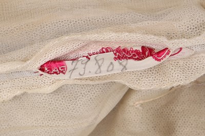 Lot 24 - A Jean Patou chinoiserie brocaded satin gown,...
