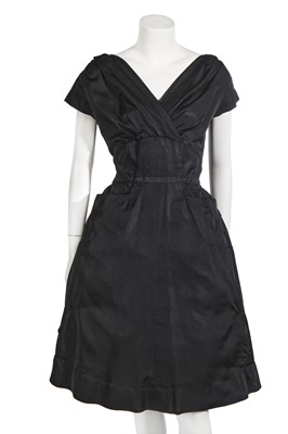 Lot 604 - A Pierre Balmain haute couture black silk cocktail dress, circa 1958