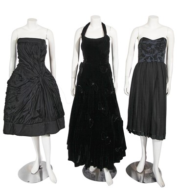 Lot 633 - Three black evening and cocktail dresses, 1950s-60s