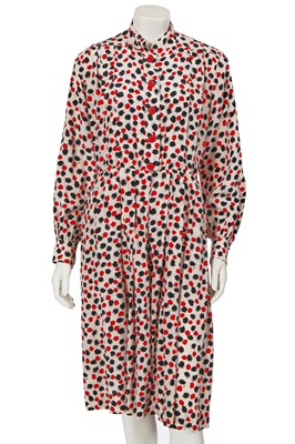Lot 450 - An Yves Saint Laurent spot printed silk dress, Spring-Summer 1984