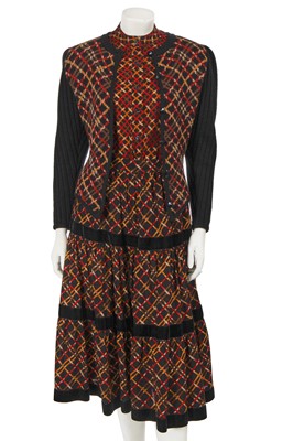 Lot 453 - An Yves Saint Laurent black red and orange checked wool three piece ensemble, Autumn-Winter 1983-84