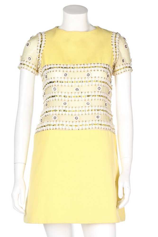 Lot 69 - A Torrente couture yellow worsted mini-dress,...