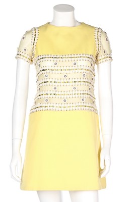 Lot 69 - A Torrente couture yellow worsted mini-dress,...