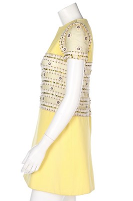 Lot 69 - A Torrente couture yellow worsted mini-dress,...
