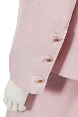 Lot 242 - A Chanel by Philippe Guibourge pink slubbed silk suit, 1970s