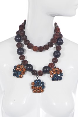 Lot 439 - An Yves Saint Laurent wooden bead choker necklace, 1980s
