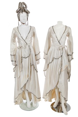 Lot 513 - Two ivory satin showgirl gowns, 1970s