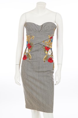 Lot 243 - An Alexander McQueen embroidered blue and white striped cotton dress, 2007