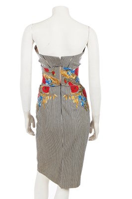 Lot 243 - An Alexander McQueen embroidered blue and white striped cotton dress, 2007