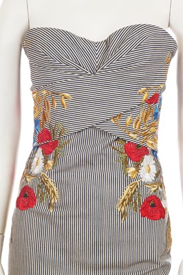 Lot 243 - An Alexander McQueen embroidered blue and white striped cotton dress, 2007