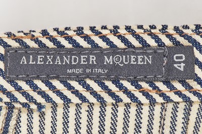 Lot 243 - An Alexander McQueen embroidered blue and white striped cotton dress, 2007
